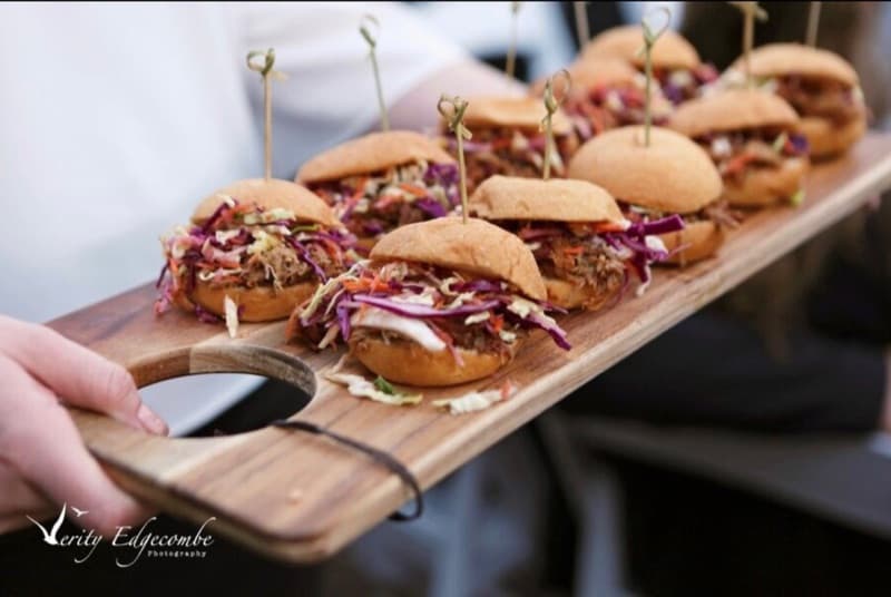 Pulled pork sliders with rainbow slaw served on a timber paddle board for Adelaide cocktail catering