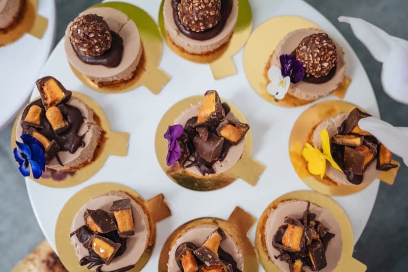Overhead view of handmade cheesecakes for an Adelaide corporate dessert table