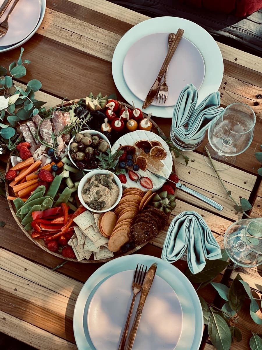 Baby shower grazing display with pastel florals and sweet treats by Event Gourmet Adelaide